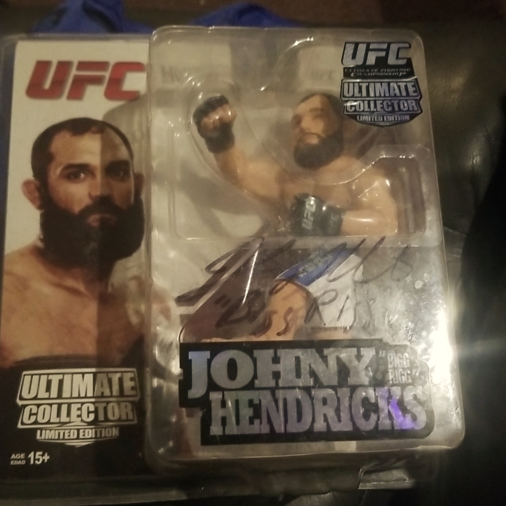 Johnny Hendricks action figure with inscription bigg rigg